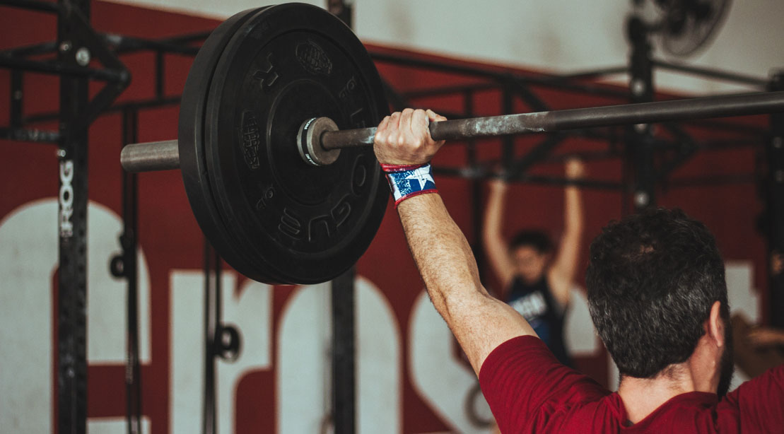 Barbell Overhead Carry Exercise: How To, Benefits, Variations 