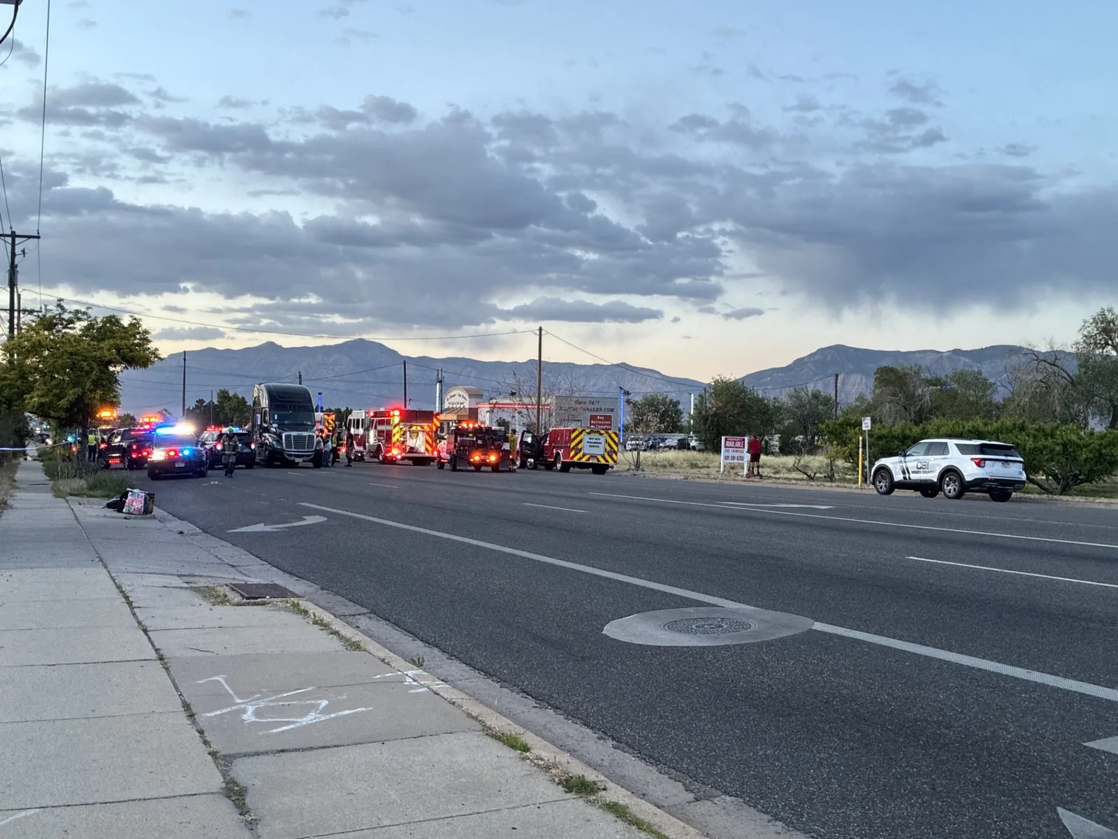 Police investigate a multi-vehicle crash scene in Roy, Utah