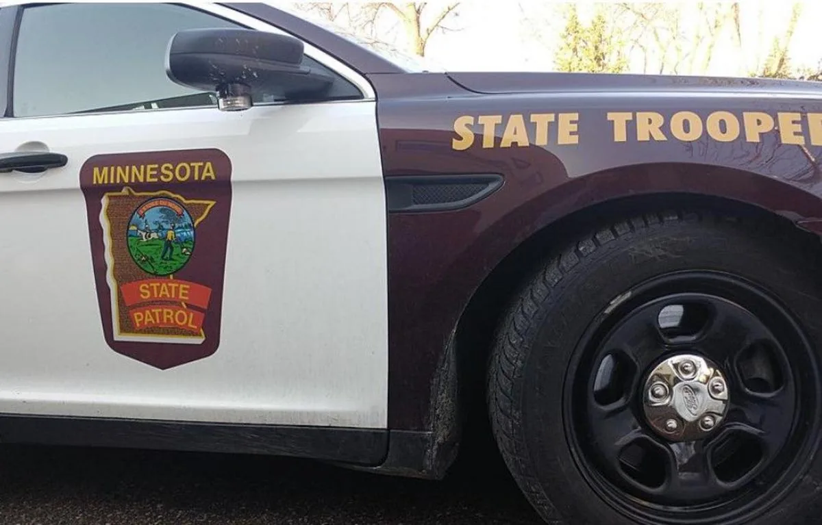 Police investigate a head-on crash scene on a rural highway near Farmington, Minnesota